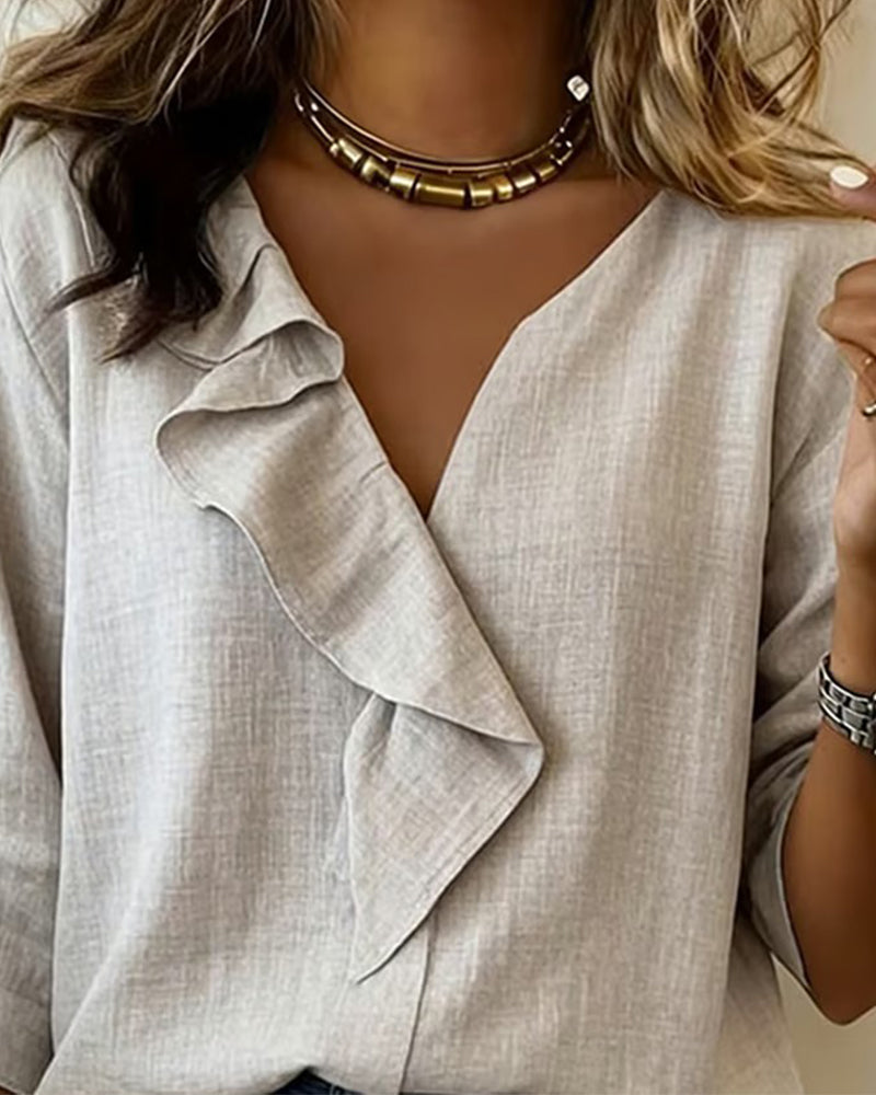 Noa | Blusa lisa con volantes y mangas largas
